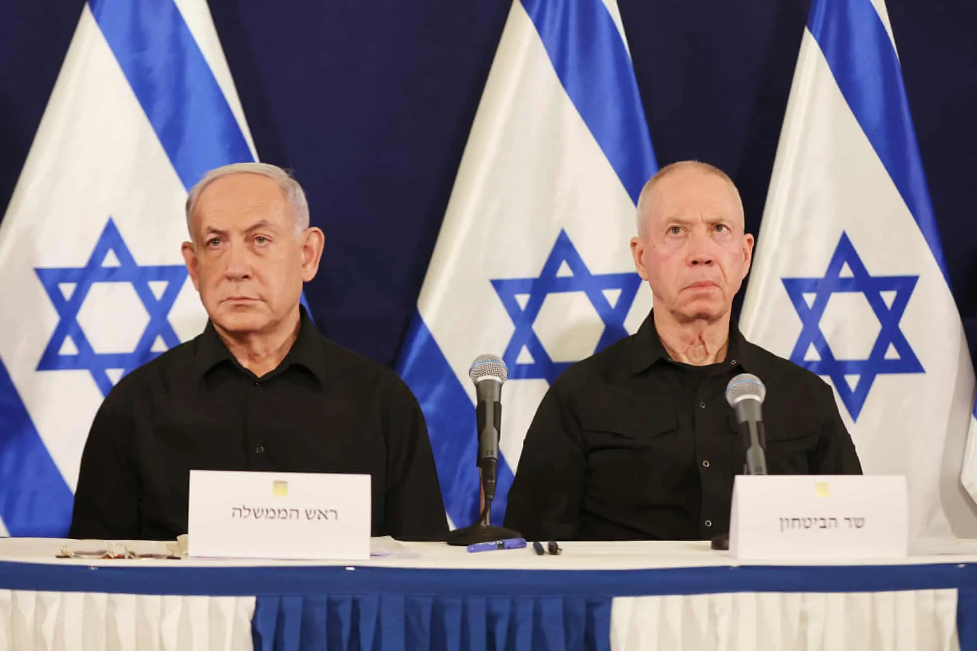Benjamin Netanyahu, the Israeli prime minister, and his defence minister, Yoav Gallant, give a press conference at the Kirya military base in Tel Aviv.
      Photograph: Abir Sultan/AP